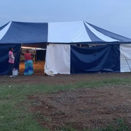 A blue and white tent used for ministry in South Africa