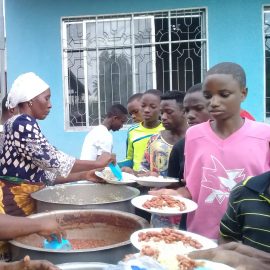 People eating at the Saturday meal