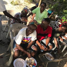 People eating at the Saturday meal