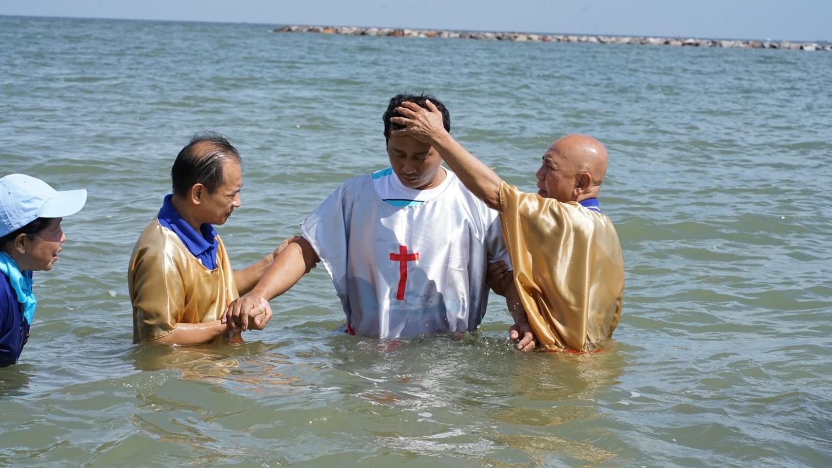 Albert & Pastor Tewa Baptizing a New Believer