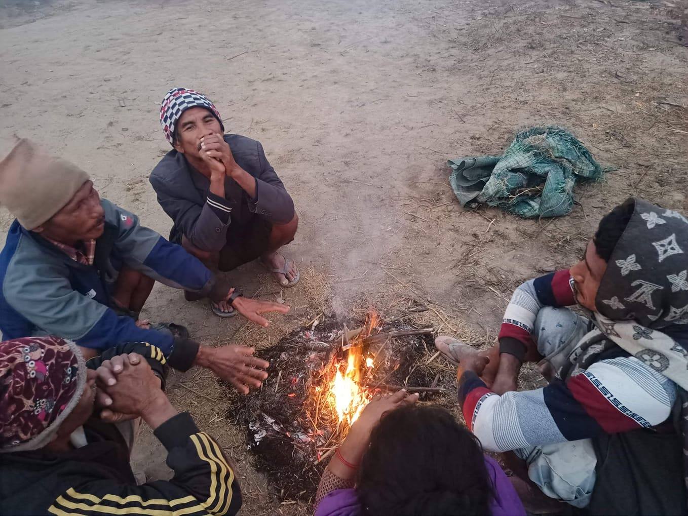 Men around a fire in Nepal