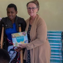 Althea showing the Bible used for the Bibles for Malawi campaign