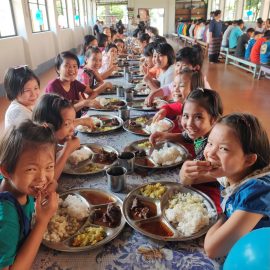 Children enjoying a meal at the ministry center