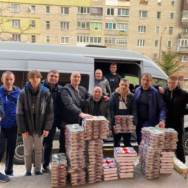 Ukrainian Humanitarian Team delivering food parcels. 