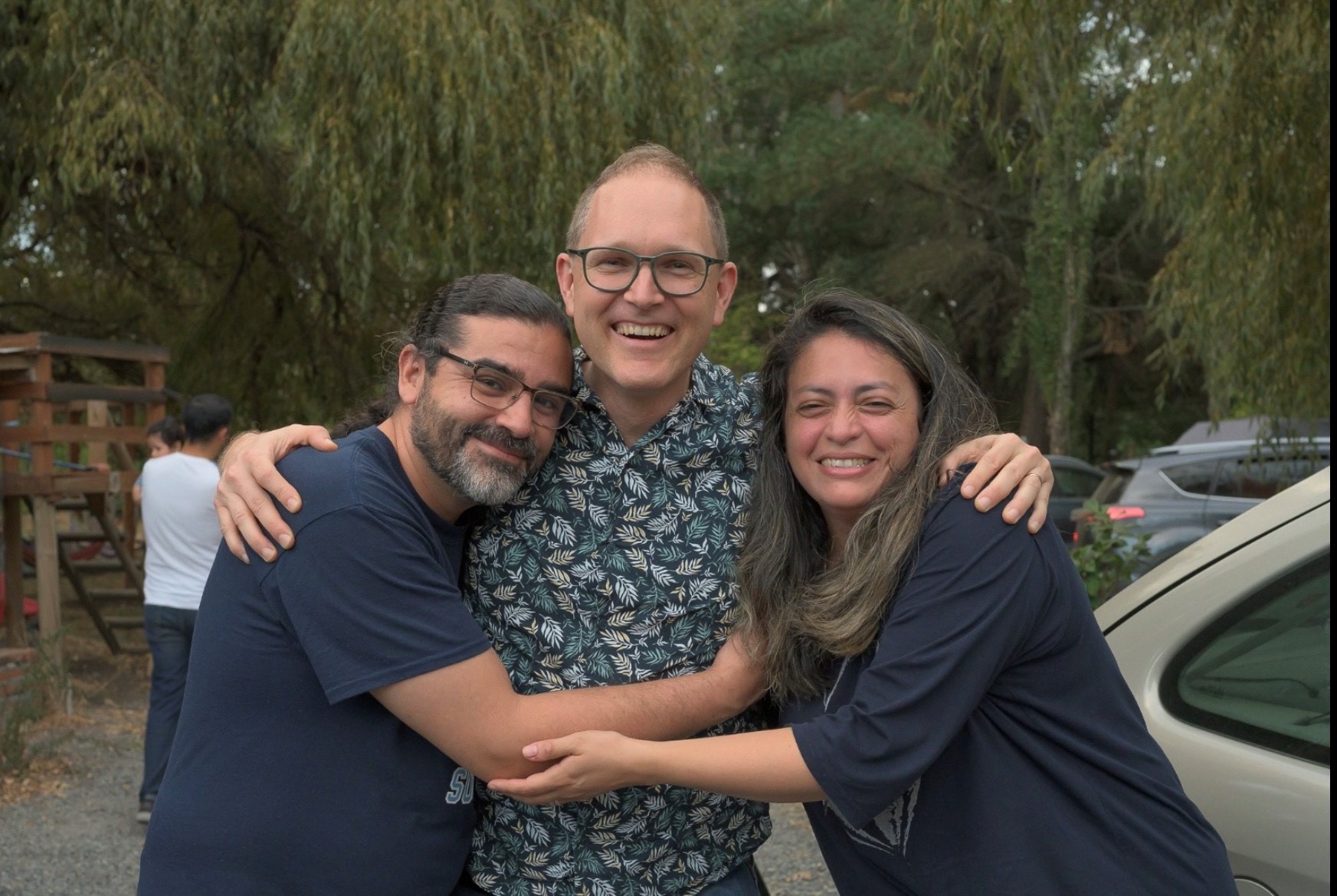 Matt with Jenn Pinares and her husband who have started a new church.