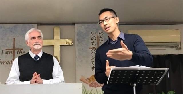 Hiro ministering alongside Missionary Russell Board