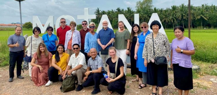 Debra Crook with Thai host pastor and wife, TEAMS group, and missionaries Albert & Jiep Gonzales.