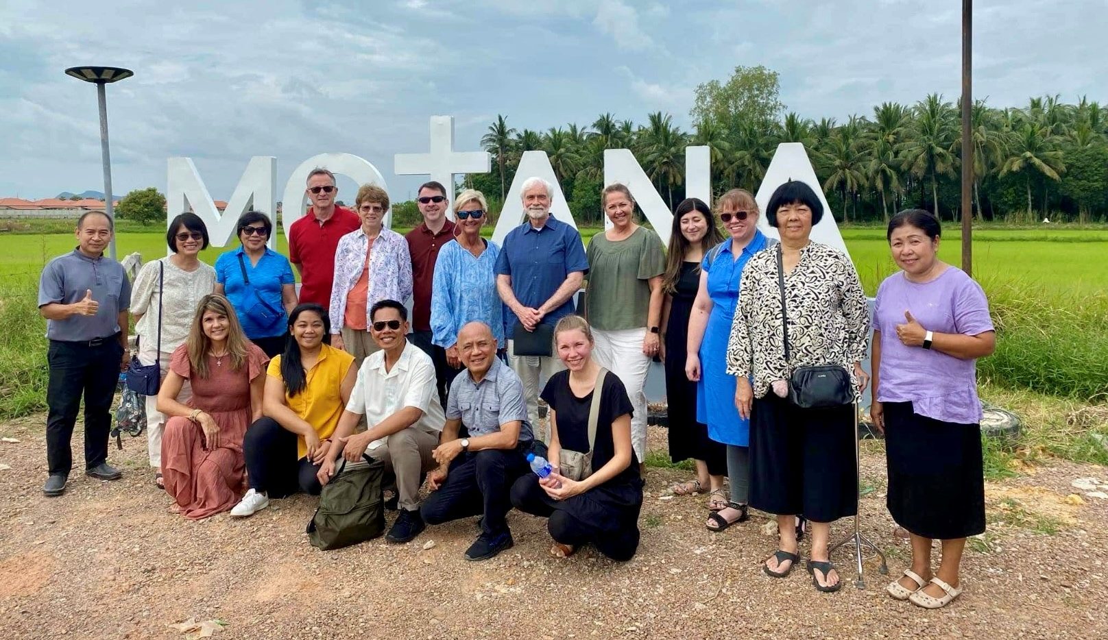 Debra Crook with Thai host pastor and wife, TEAMS group, and missionaries Albert & Jiep Gonzales.