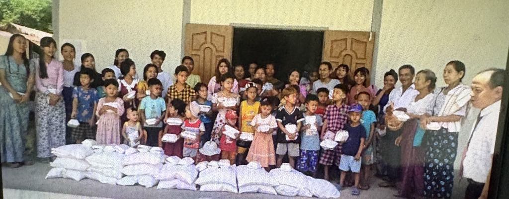 Children and families in Myanmar received rice relief packs—grateful smiles filled the air as hope arrived in their community.