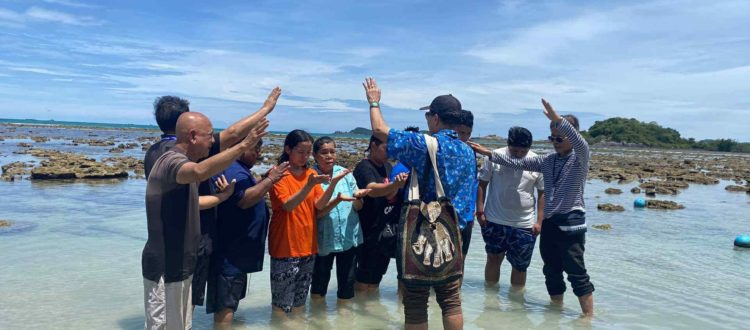 Water baptism of six new believers from Don Muang Church.