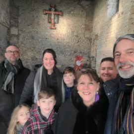 The Presleys with their extended family in the oldest church in the U.K., which is now a chapel.