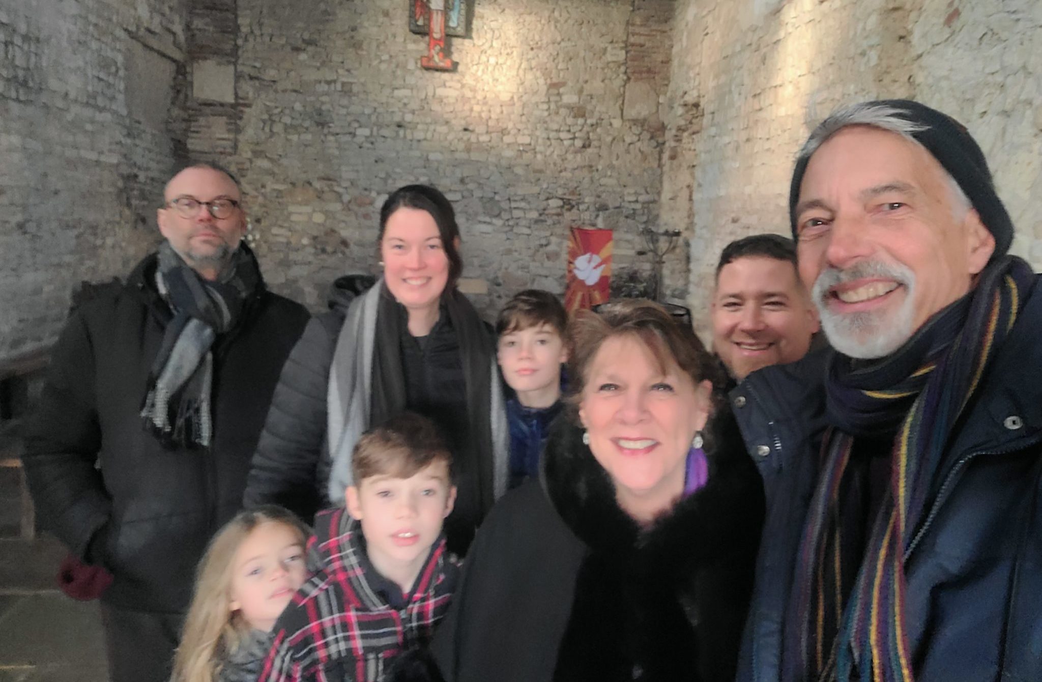 The Presleys with their extended family in the oldest church in the U.K., which is now a chapel.